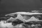 USA, Wyoming. Black and white of stratus clouds forming over Teton Range seen from the west. Art Print